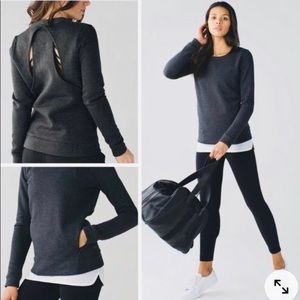 Lululemon pullover with back cutouts.